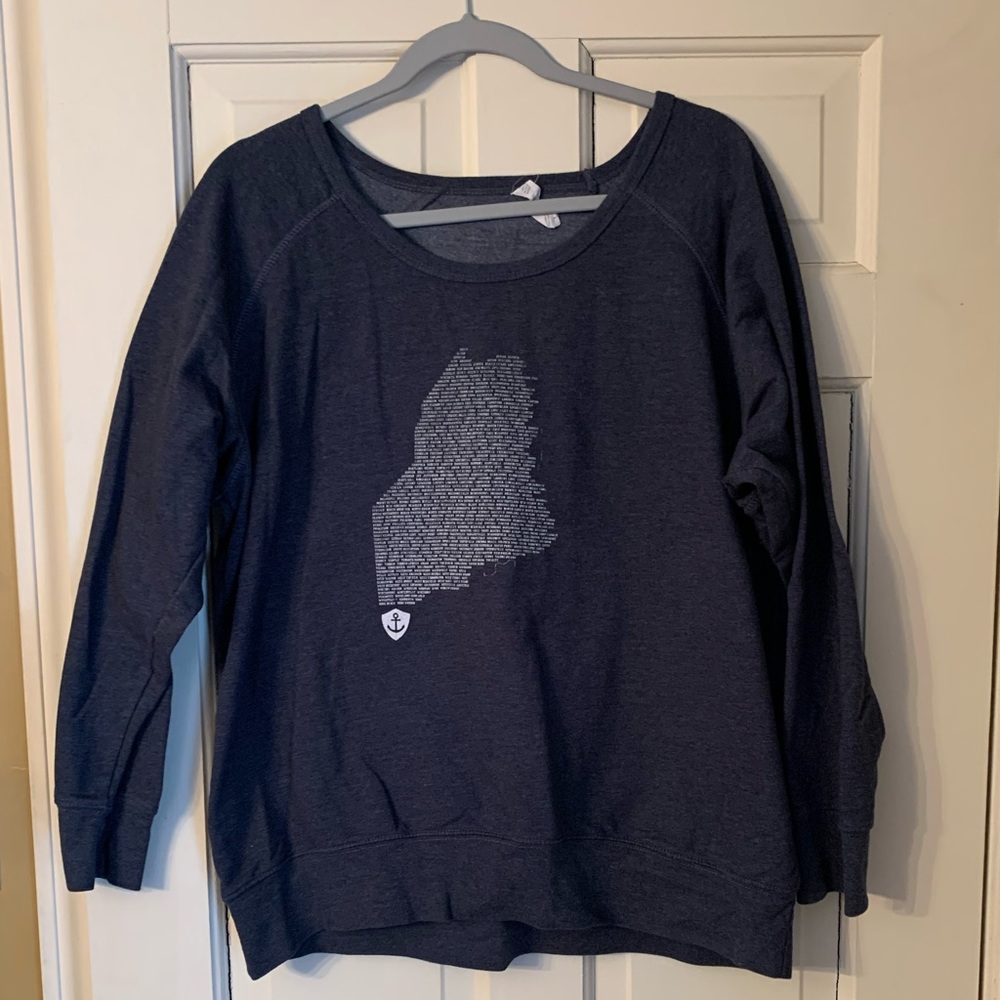 Navy blue Maine crewneck. City names inside state shape